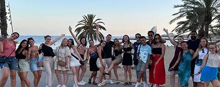 Topdeck tour group taking a group photo together in the tropics.